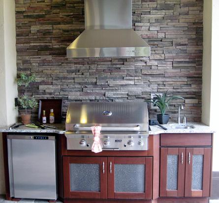 Lifestyle outdoor cabinets with stacked stone by Lifestyle Outdoor Kitchens